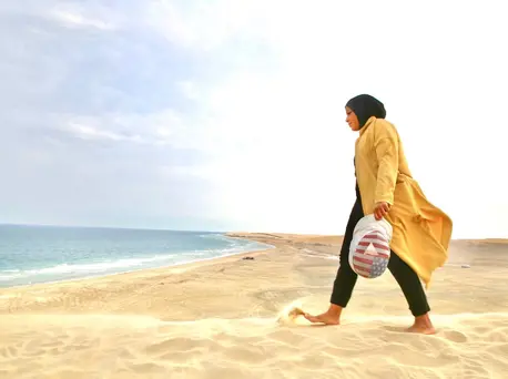 Ibtihaj Muhammad on the beach in Sealine, Qatar. Ibtihaj Muhammad on the beach in Sealine, Qatar.