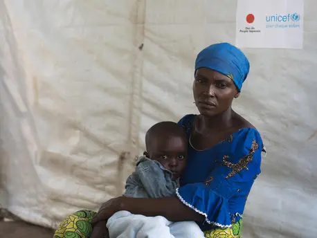 Zuliya Nboyo brings her son, Kayoka, 2. to a community health worker at an Internally Displaced Persons camp in Kalemi, Tanganyika province, Democratic Republic of Congo in November 2018. Zuliya Nboyo brings her son, Kayoka, 2. to a community health worker at an Internally Displaced Persons camp in Kalemi, Tanganyika province, Democratic Republic of Congo in November 2018.
