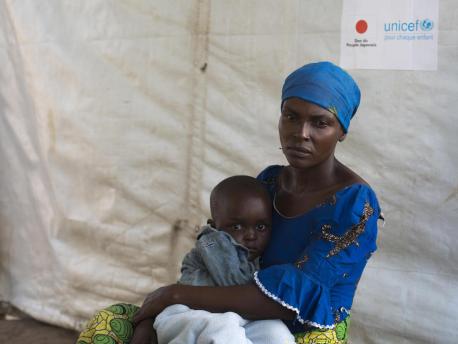 Zuliya Nboyo brings her son, Kayoka, 2. to a community health worker at an Internally Displaced Persons camp in Kalemi, Tanganyika province, Democratic Republic of Congo in November 2018. 
