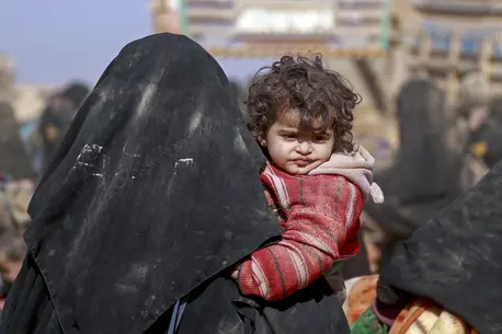 Syrian families displaced by war prepare for a 3-day trek to a UNICEF-supported camp where children can receive nutrition and health care. Syrian families displaced by war prepare for a 3-day trek to a UNICEF-supported camp where children can receive nutrition and health care.