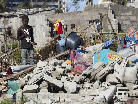 On 24 March 2019 in Mozambique, a boy stands near a destroyed house in an area that was flooded after Cyclone Idai made landfall in Beira. On 24 March 2019 in Mozambique, a boy stands near a destroyed house in an area that was flooded after Cyclone Idai made landfall in Beira.