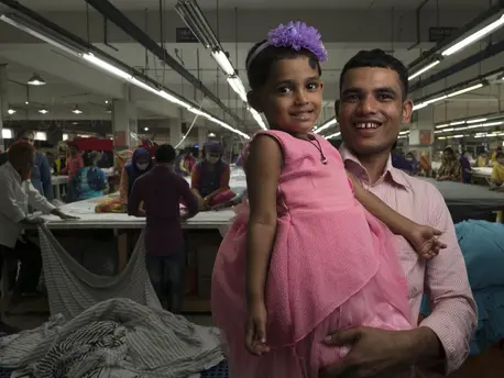 Jamal Hossain's daughter Jui, 30 months, attends a UNICEF-supported day care center at the garment factory where he works outside Dhaka, Bangladesh on December 6, 2018.. Jamal Hossain's daughter Jui, 30 months, attends a UNICEF-supported day care center at the garment factory where he works outside Dhaka, Bangladesh on December 6, 2018..