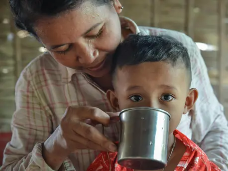 In Cambodia's Kompong Cham province, Ven Thuy, 38, and her child have safe, clean water to drink, thanks to the Kampong Chamlong Water Supply utility's partnership with UNICEF. In Cambodia's Kompong Cham province, Ven Thuy, 38, and her child have safe, clean water to drink, thanks to the Kampong Chamlong Water Supply utility's partnership with UNICEF.
