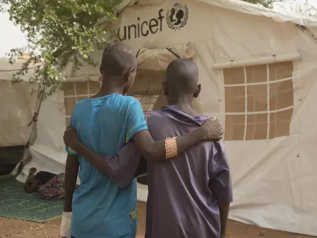 Two injured children outside a UNICEF tent at the regional hospital in Mopti, Mali, April 2019. Two injured children outside a UNICEF tent at the regional hospital in Mopti, Mali, April 2019.