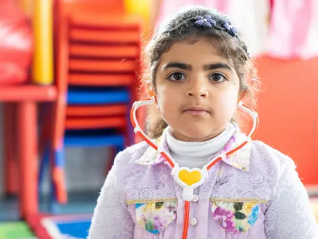 Haneen, 5, in her new kindergarten classroom, built and equipped by UNICEF, in Za'atari Refugee Camp, Jordan. Haneen, 5, in her new kindergarten classroom, built and equipped by UNICEF, in Za'atari Refugee Camp in Jordan.