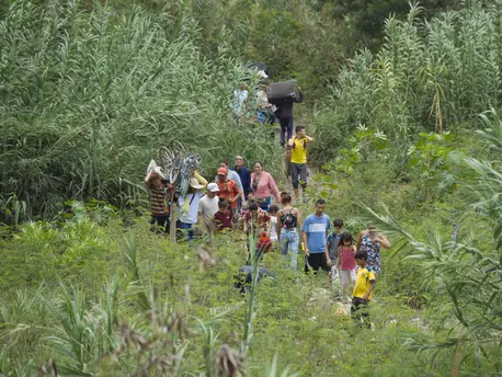 Uncertainty in Venezuela is prompting many to leave for other countries in the region. Here, a group of Venezuelans cross the border in Cucuta, Colombia in April 2019. Uncertainty in Venezuela is prompting many to leave for other countries in the region. Here, a group of Venezuelans cross the border in Cucuta, Colombia in April 2019.