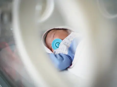 A newborn baby lies in the nursery at Alsadaqah Hospital, supported by UNICEF, in Aden, Yemen. A newborn baby lies in the nursery at Alsadaqah Hospital, supported by UNICEF, in Aden, Yemen.