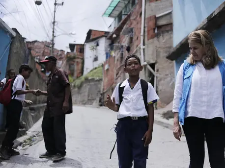 On June 4, 2019, 9-year-old student Wilker speaks with UNICEF Director of Communications Paloma Escudero in Petare, on the outskirts of Caracas, Venezuela. On June 4, 2019, 9-year-old student Wilker speaks with UNICEF Director of Communications Paloma Escudero in Petare, on the outskirts of Caracas, Venezuela.