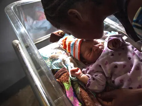 Akosusu Siska kisses her one day old baby, Reagen, in the UNICEF-supported Jules Chevalier clinic in Mbandaka, Équateur Province, the Democratic Republic of the Congo (DRC). Akosusu Siska kisses her one day old baby, Reagen, in the UNICEF-supported Jules Chevalier clinic in Mbandaka, Équateur Province, the Democratic Republic of the Congo (DRC).