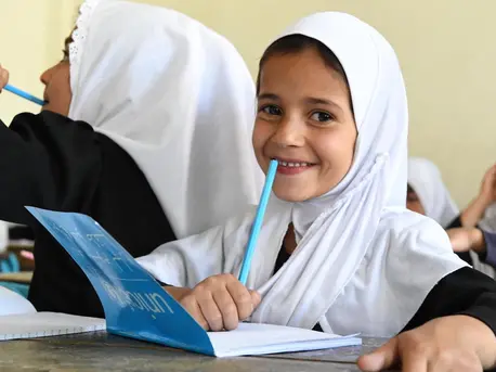 Children at the Bibi Amina Girls High School in Panjshir, a province in the North of Afghanistan, are excited with their new UNICEF school kits. Children at the Bibi Amina Girls High School in Panjshir, a province in the North of Afghanistan, are excited with their new UNICEF school kits.