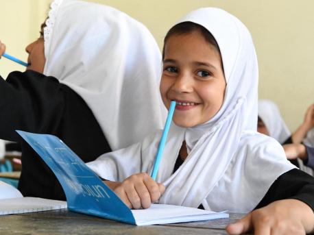 Children at the Bibi Amina Girls High School in Panjshir, a province in the North of Afghanistan, are excited with their new UNICEF school kits.