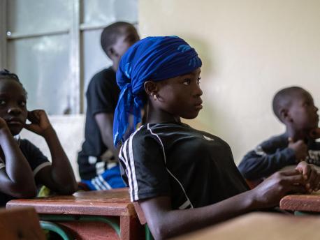 A UNICEF-supported program linking soccer and academics in Niamey, Niger keeps teenagers like Pascaline in school.