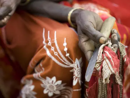 In Ethiopia's Afar Region, a former practitioner of female genital mutilation holds the tool she used to perform the procedure. In Ethiopia's Afar Region, a former practitioner of female genital mutilation holds the tool she used to perform the procedure.