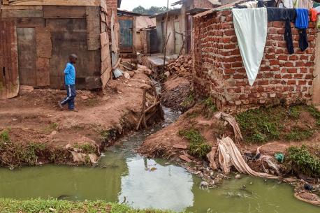 Informal settlements in Kampala City, Uganda, lack proper infrastructure and resort to using communal latrines.