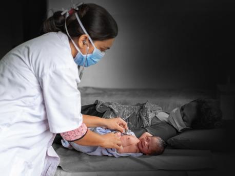 Medical Professional Treats Baby