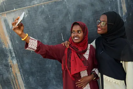 Two People Taking a Selfie