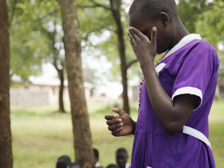 At Kalas Girls Primary School in Uganda's Amudat district, a student breaks down as she describes running away from home to avoid being subjected to female genital mutilation in 2018. 
