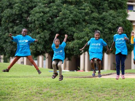 Koumba, Jean Uriel, Mariam and Yasmine jump for joy before World Children's Day 2020 in Abidjan, Côte d'Ivoire.