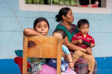 Juana, 9, photographed with her mother and siblings at a shelter in Campur, San Pedro Carchá, Alta Verapaz, Guatemala.