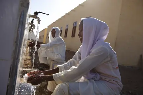 Women Washing Hands