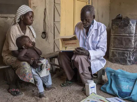 On January 13, 2020, Loveleen Anex, 25, holds her 9-month-old daughter, Ensteen, as UNICEF-supported health worker Benjamin Daniels does a general health check on the child in the village of Jarede, Adamawa state, Nigeria. On January 13, 2020, Loveleen Anex, 25, holds her 9-month-old daughter, Ensteen, as UNICEF-supported health worker Benjamin Daniels does a general health check on the child in the village of Jarede, Adamawa state, Nigeria.