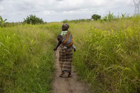 Maria Malo (32) carries her son Antonio Malo (1), after having received treatment at a UNICEF health centre in the Ndjenja Resettlement camp, Mozambique, Wednesday, 04 March 2020. After two major cyclones in one season, extreme drought and renewed floodin Maria Malo (32) carries her son Antonio Malo (1), after having received treatment at a UNICEF health centre in the Ndjenja Resettlement camp, Mozambique, Wednesday, 04 March 2020. After two major cyclones in one season, extreme drought and renewed floodin