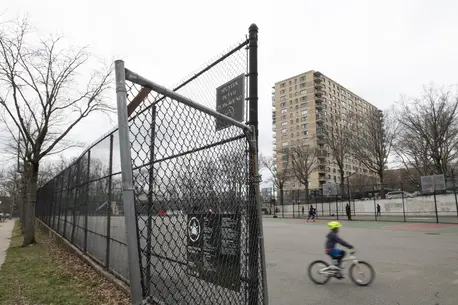 On 17 March 2020, a child rides a bike through an empty playground outside of Public School 24 in the Riverdale neighbourhood of the Bronx, New York City, United States of America. On 17 March 2020, a child rides a bike through an empty playground outside of Public School 24 in the Riverdale neighbourhood of the Bronx, New York City, United States of America.