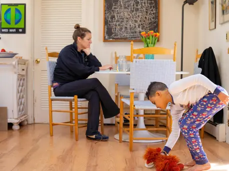 On the morning of 18 March 2020 in Connecticut, Luka, 8, plays with stuffed animals in between completing school exercises on his third day of distance learning from home, while his mother, Sophia, works on her computer. On the morning of 18 March 2020 in Connecticut, Luka, 8, plays with stuffed animals in between completing school exercises on his third day of distance learning from home, while his mother, Sophia, works on her computer.