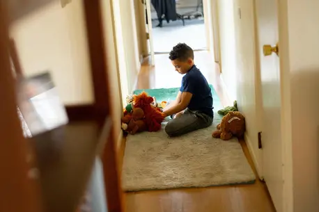 Luka, 8, plays with stuffed animals in between completing school work on his first day learning from home after his school in Connecticut closed due to the coronavirus outbreak. Luka, 8, plays with stuffed animals in between completing school work on his first day learning from home after his school in Connecticut closed due to the coronavirus outbreak.