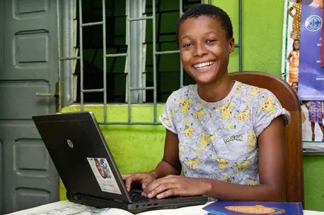 With an internet connection at home in Yopougon, a suburb of Abidjan, Côte d'Ivoire, Tchétché, 16, is able to participate in women's leadership training online during the COVID-19 pandemic. With an internet connection at home in Yopougon, a suburb of Abidjan, Côte d'Ivoire, Tchétché, 16, is able to participate in women's leadership training online during the COVID-19 pandemic.