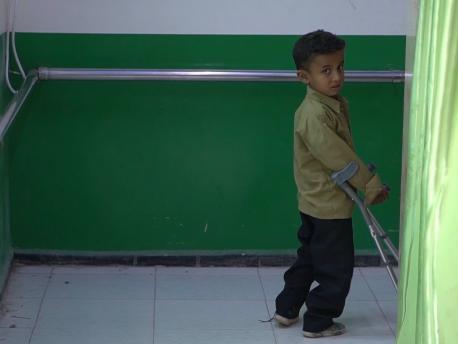 Child Walking with Crutches