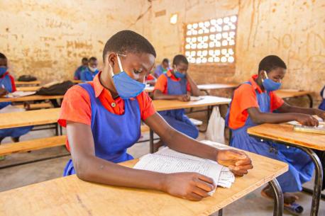 Having a desk helps students in Malawi maintain social distancing and prevent spread of COVID-19.