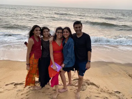 People Posing on a Beach