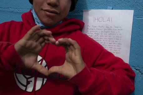 A boy reacts to a letter of support he received from another Mexican teenager at a shelter for unaccompanied migrant adolescents in Tijuana, Mexico. 
