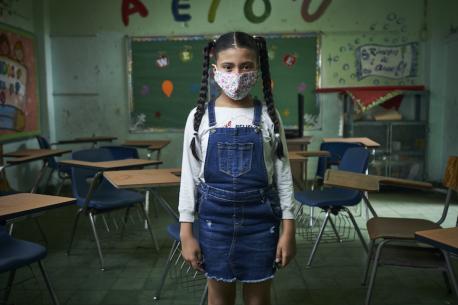A student photographed in an empty classroom in Panama City, Panama, on Sept. 16, 2020.