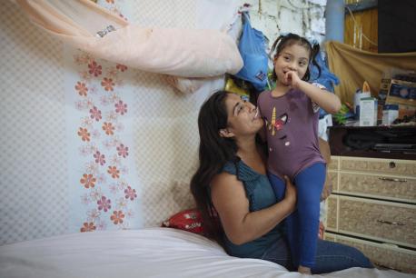 Magdalena, a UNICEF community health worker, and her daughter, Brithany, at home in Monte Sinaí, Guayaquil, Ecuador in 2021.