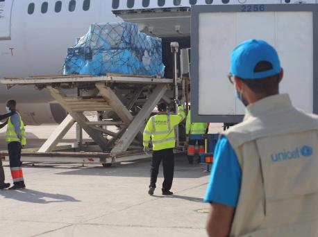 A UNICEF staff member works with partners to facilitate the delivery of a new shipment of 31,200 additional doses of Covid-19 vaccine on April 26, 2021 to Nouakchott International Airport in Mauritania as part of the COVAX initiative.