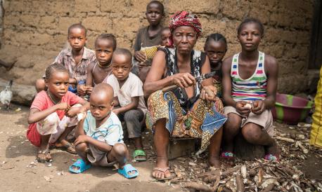 Fatu Turay with her nine grandchildren in Senthai Community, Magbema Chiefdom, Sierra Leone.