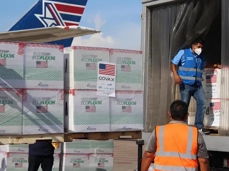 Vaccines are loaded into refrigerated trucks after 1.5 million doses of COVID-19 vaccines donated by United States Government via COVAX’s dose-sharing mechanism arrived at Armando Escalón Espinal Air Base, San Pedro Sula Airport, Honduras on June 27, 2021 Vaccines are loaded into refrigerated trucks after 1.5 million doses of COVID-19 vaccines donated by United States Government via COVAX’s dose-sharing mechanism arrived at Armando Escalón Espinal Air Base, San Pedro Sula Airport, Honduras on June 27, 2021