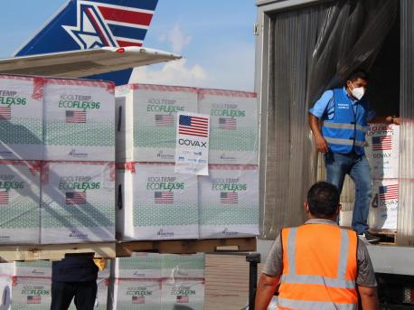 Vaccines are loaded into refrigerated trucks after 1.5 million doses of COVID-19 vaccines donated by United States Government via COVAX’s dose-sharing mechanism arrived at Armando Escalón Espinal Air Base, San Pedro Sula Airport, Honduras on June 27, 2021