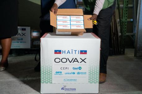 COVID-19 vaccine doses, donated by the U.S. government as part of the COVAX dose-sharing program, arrive in Port-au-Prince on July 13, 2021.