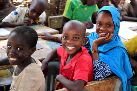 Three Children Smiling