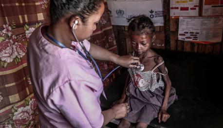 A health worker tends to a malnourished child at the Bekiria Basic Health Center in Fenaivo, Ifotaka Commune, Amboasary Sud, Anosy region, Madagascar.