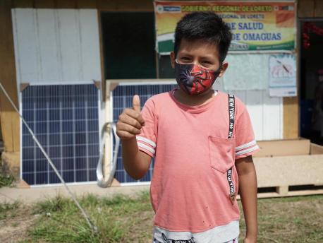 In San Joaquín de Omaguas, Loreto region, Peru, UNICEF and Peru's Ministry of Health installed a solar-powered freezer for optimal vaccine storage.