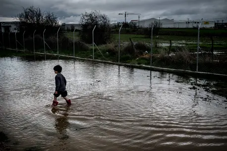 child Wading in Water