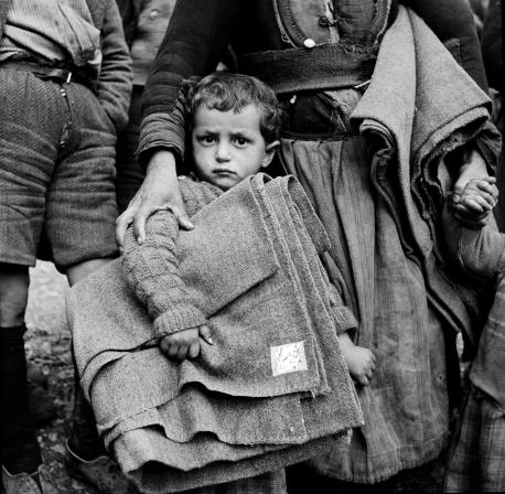 Young Child Holding Blanket