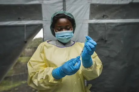 Person Preparing Vaccination