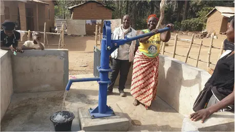 Another new safe water access point opens in a village in Guinea. Another new safe water access point opens in a village in Guinea.