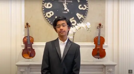Person with Violins Behind Them