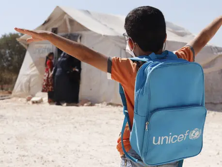 In Idlib, Syria, 9-year-old Rafat sets off for a learning center supported by UNICEF with funding from Education Cannot Wait. In Idlib, Syria, 9-year-old Rafat sets off for a learning center supported by UNICEF with funding from Education Cannot Wait.